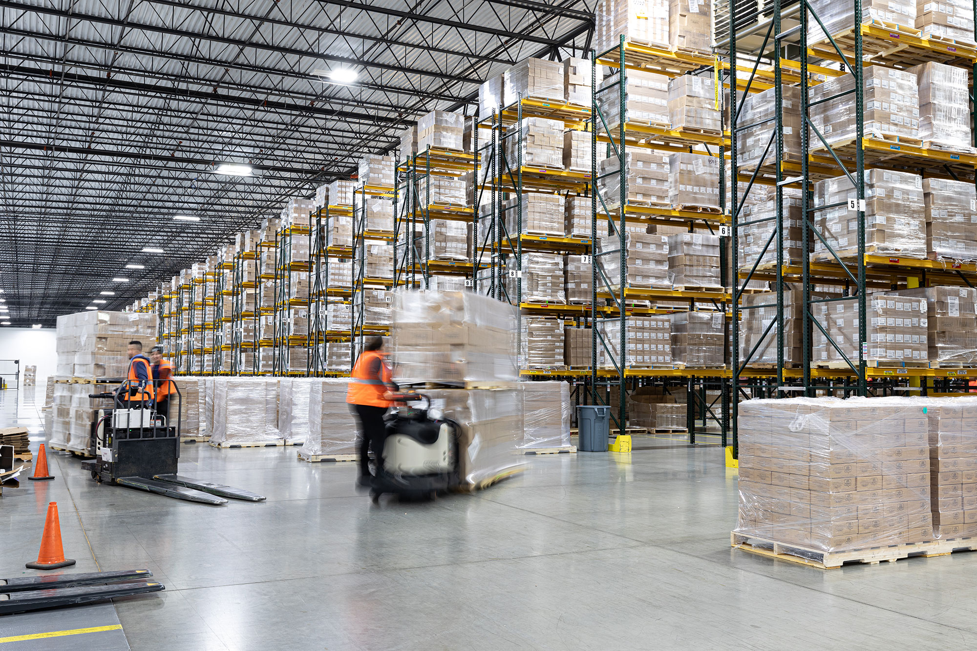 Roadtex warehouse stacked with pallets of organized product. 