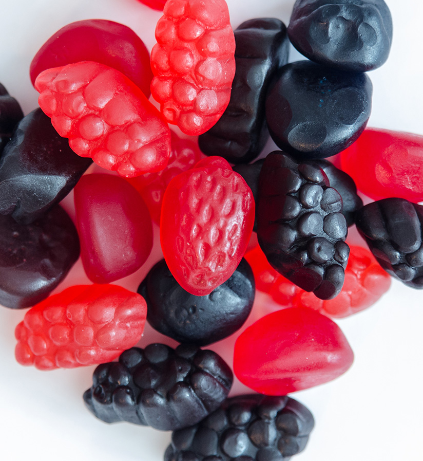 A pile of fruit gummies waiting to be packaged.