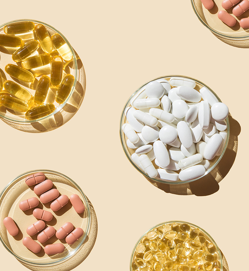 Different types of healthcare product pills in petri dishes.