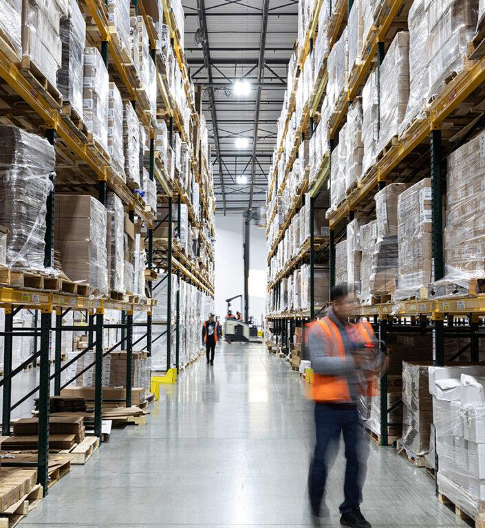 Warehouse workers checking warehouse inventory.